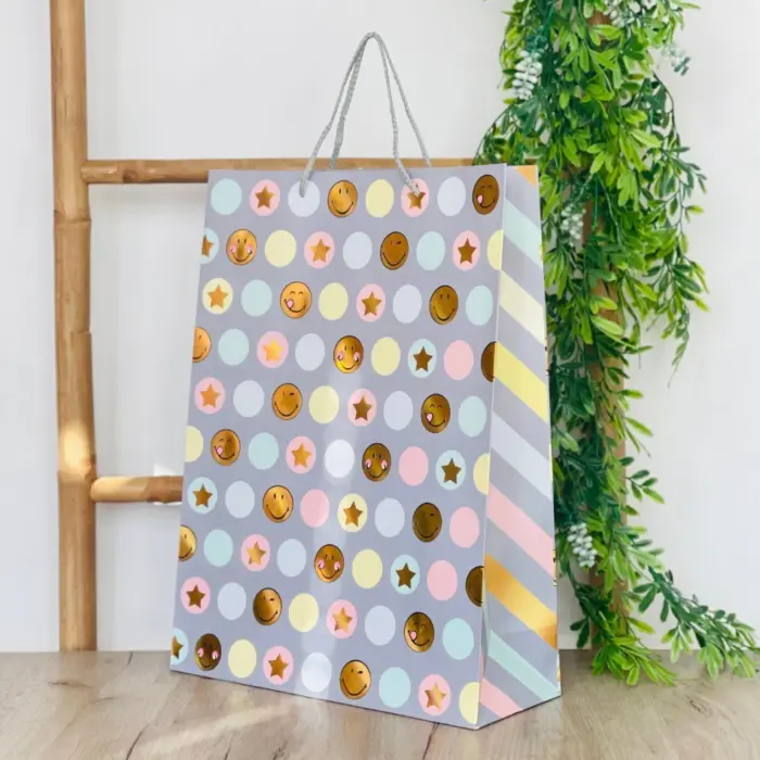 Decorative gift bag with dots, stars and smiley faces, 31 x 42 x 12 cm