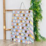 Decorative gift bag with dots, stars and smiley faces, 31 x 42 x 12 cm